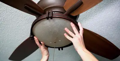 Ceiling fan repair and reinstallation on ceiling mount in Indianapolis, IN