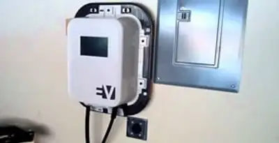 Electric car charger installation with wall-mounted EV charging station in Indianapolis, IN