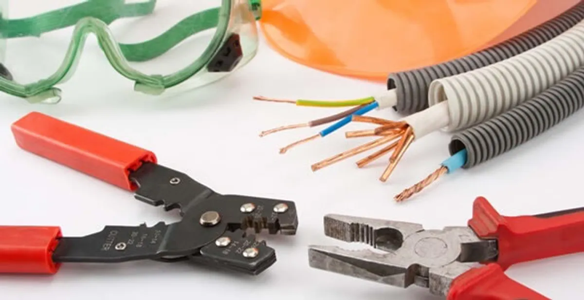 Electrical wiring repair with professional tools and safety equipment in Camby, IN