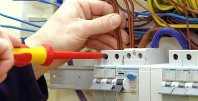 electrician services performing professional electrical panel wiring and connections in Indianapolis, IN