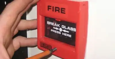 fire alarm installation service showing manual fire alarm pull station installed by licensed electricians in Indianapolis, IN