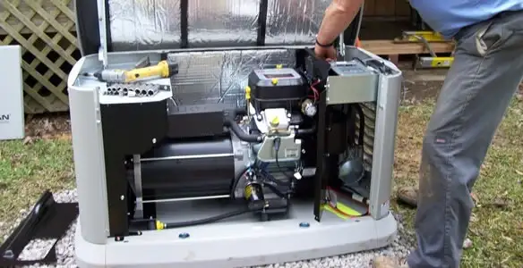 generator installation service showing technician connecting and configuring generator components in Indianapolis, IN