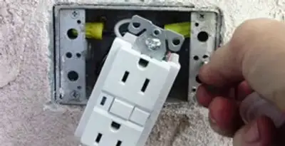 gfci circuits service showing installation of a ground fault circuit interrupter outlet by licensed electricians in Indianapolis, IN