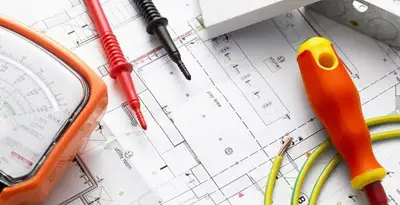 licensed electrician planning and testing electrical systems using professional tools in Indianapolis, IN
