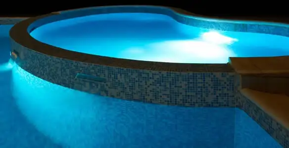 pool light installation and repair services highlighting illuminated pool interior lighting in Indianapolis, IN