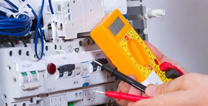 Residential electrician testing home electrical panel for safety and performance in Indianapolis, IN